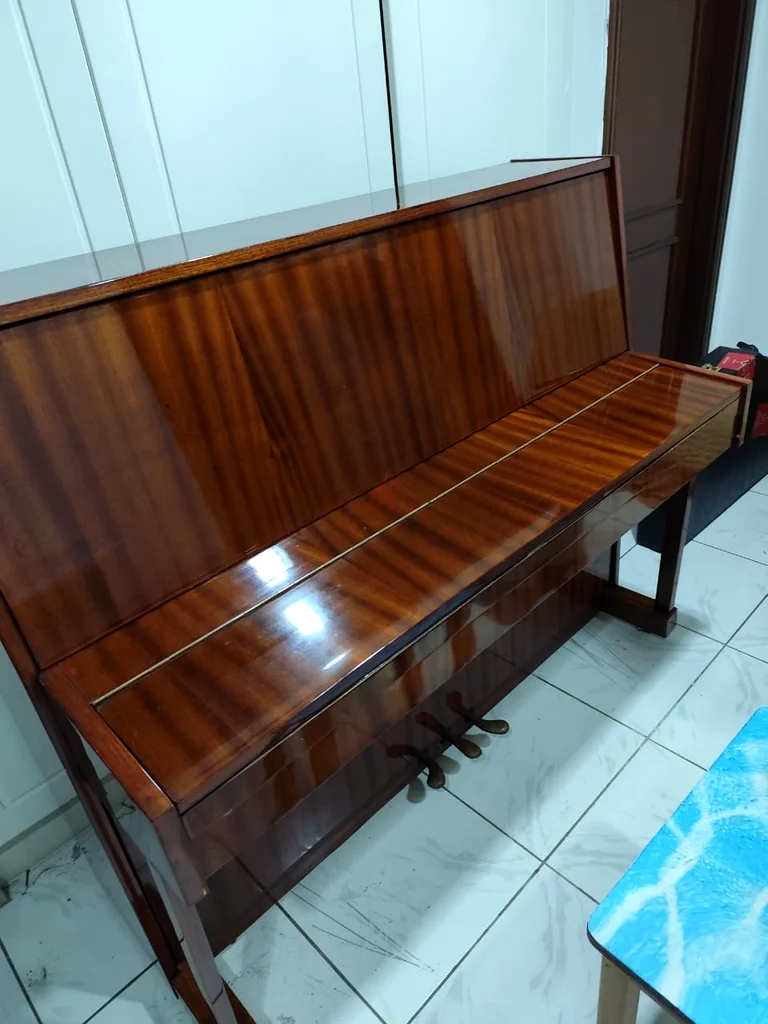 Russian upright piano63202681560834112