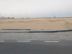 Commercial plots for sale in the Emirate of Sharjah, in the Al Dabdaba North area.