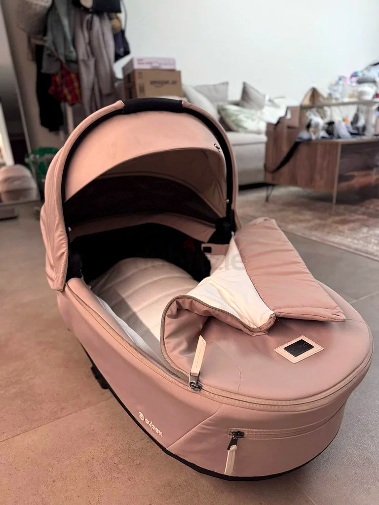 I am selling a Cybex Priam bassinet in the Cozy Beige color. It has been used for 5 months.63206873250305110
