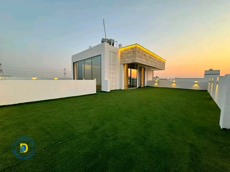 Luxury corner villa for sale in Al Helio 2, Ajman, modern finishing, 5 rooms and a roof, freehold f63187219474817113