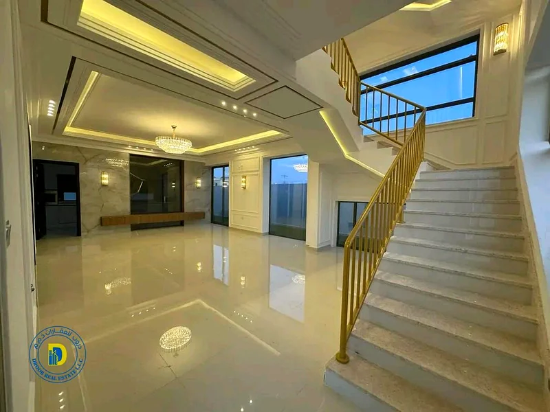Luxury corner villa for sale in Al Helio 2, Ajman, modern finishing, 5 rooms and a roof, freehold f63187219474817114