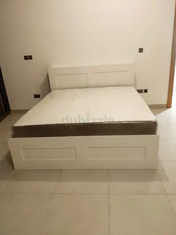 IKEA brimness king size bed with 4 storage drawers underneath and with  IKEA mattress