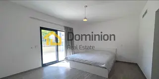 Chic and Convenient: 2-Bedroom Apartment Steps from the Beach