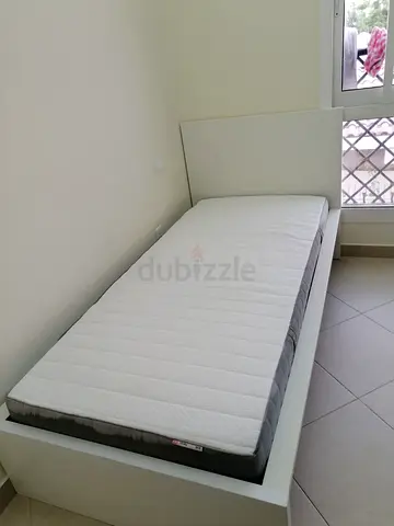 Ikea malam single bed 90/200 with  IKEA mattress is available in new condition,