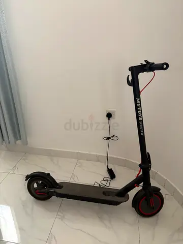 My toys electric scooter foldable led lights and a bell with charger back tire puncherd