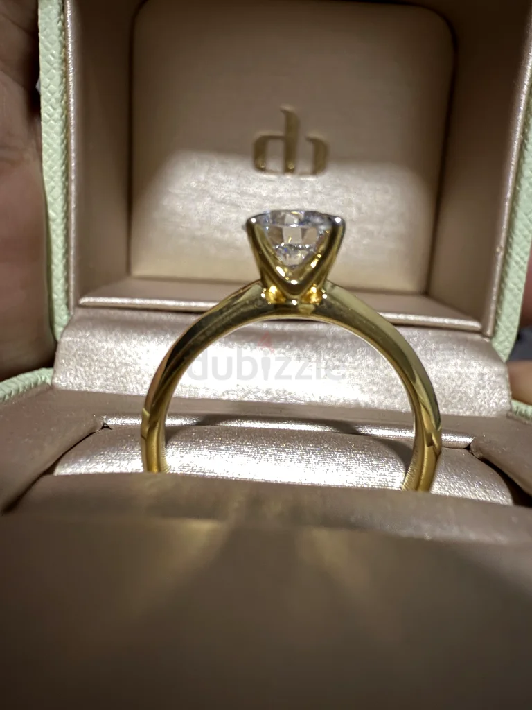 Stunning Gold Engagement Ring with Sparkling Diamond from damas
