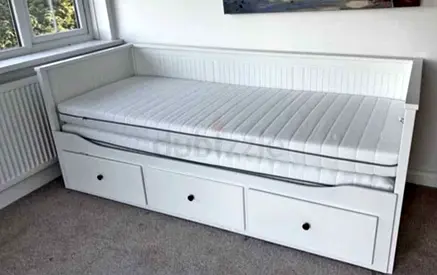 IKEA Hamnes Day bed with 3 storage drawers underneath and with 2 IKEA mattresses