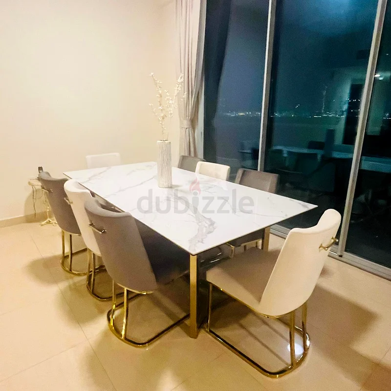 طاولة طعام مع 8 كراسي63186269341571111