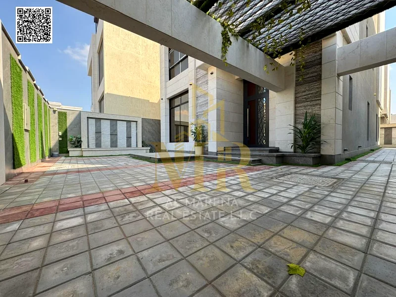 A villa with an all-inclusive price for electricity, water and air conditioning, ready for occupancy in the most upscale areas of Ajman and close to a63873323907457114
