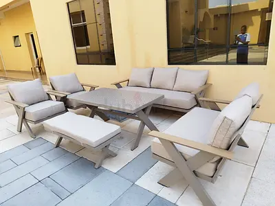 7 seater outdoor sofa set with beige cushions