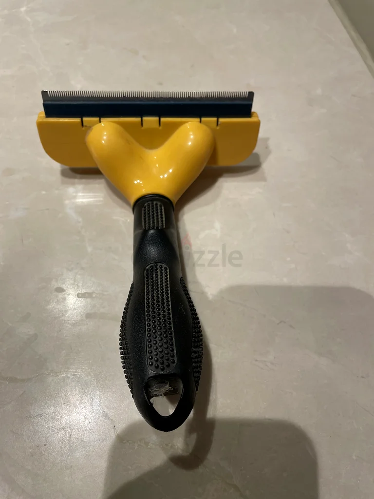 فرشاة فورمينيتور لإزالة شعر الكلب63233642740865111