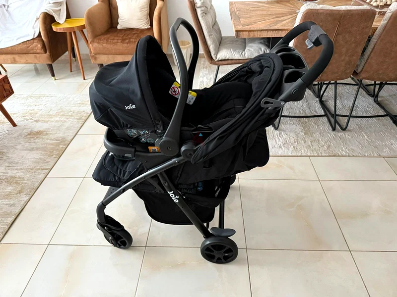 عربة أطفال جديدة مع مقعد سيارة63177121725059111