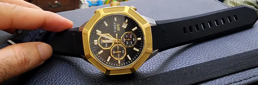 Luxurious Gold and Black Sport Watch - Stand Out Style!