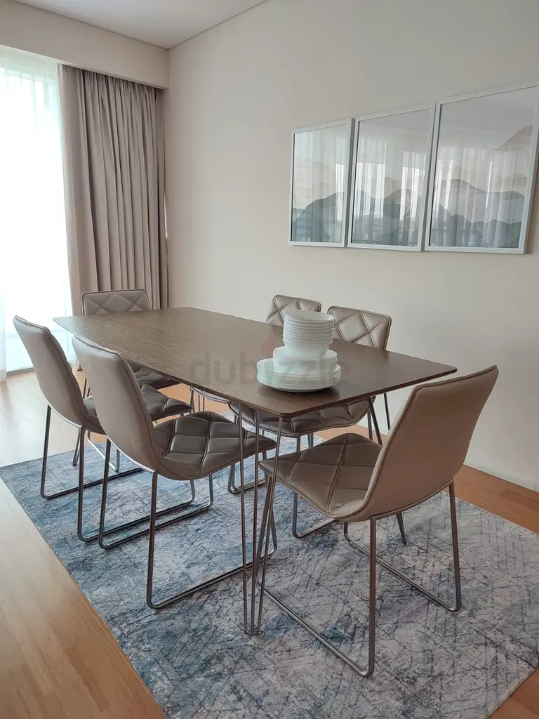 Stylish and Elegant Dining Table Set with Modern Chairs