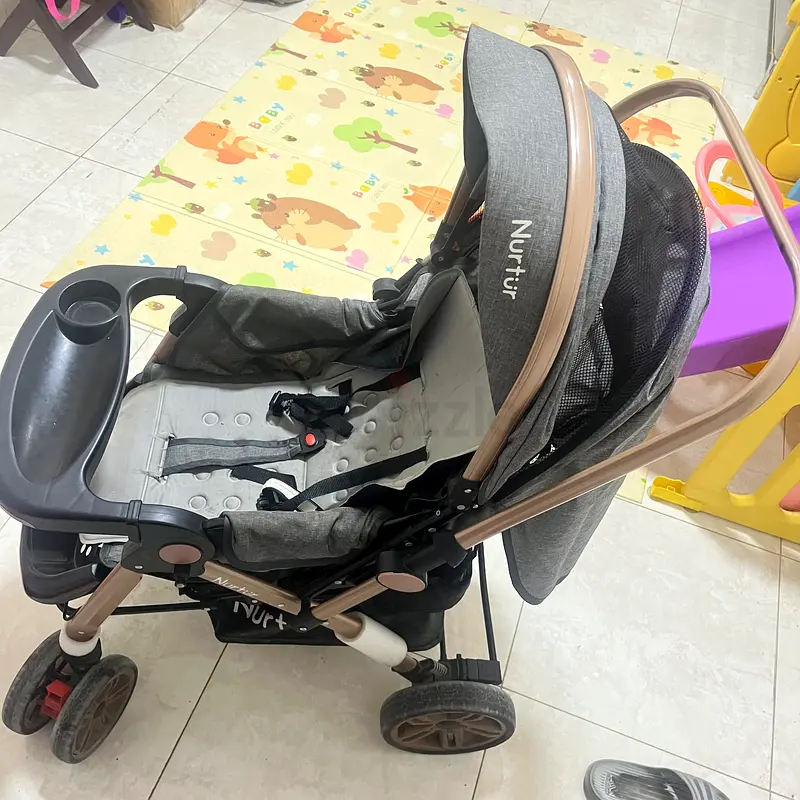 Stylish Nurture Stroller for Your Little One!