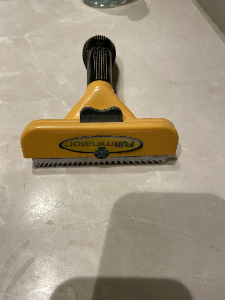 فرشاة فورمينيتور لإزالة شعر الكلب632336427408651128
