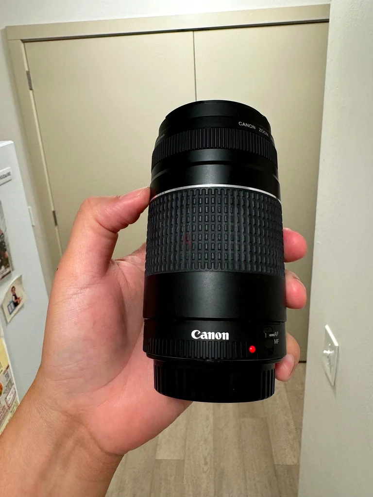 عدسة كانون EF 75-300 مم مع علبة + ضمان63172680559490111