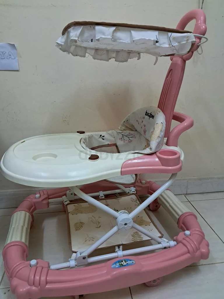 عربة أطفال وكرسي هزاز وردي جميل للبيع!632042574490911124