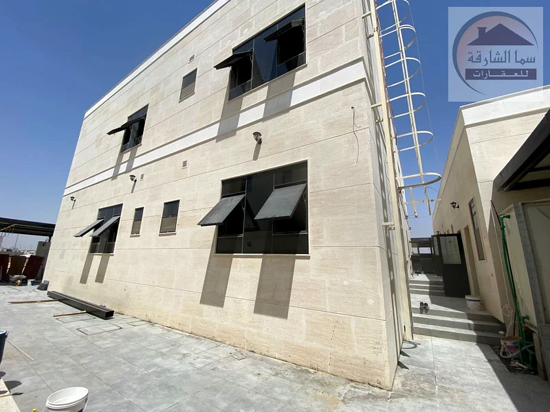 In Al-Raqeeba district, two twin villas on a corner plot of land with an area of ​​12,000 square feet, close to the entrance and exit63205836998018111
