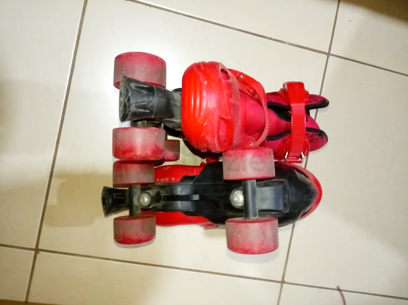 Kids Red Roller Skates - Fun Outdoor Activity!632457119953941117