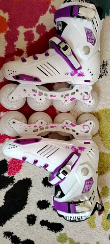 Stylish White and Purple Roller Skates – Glide in Style!
