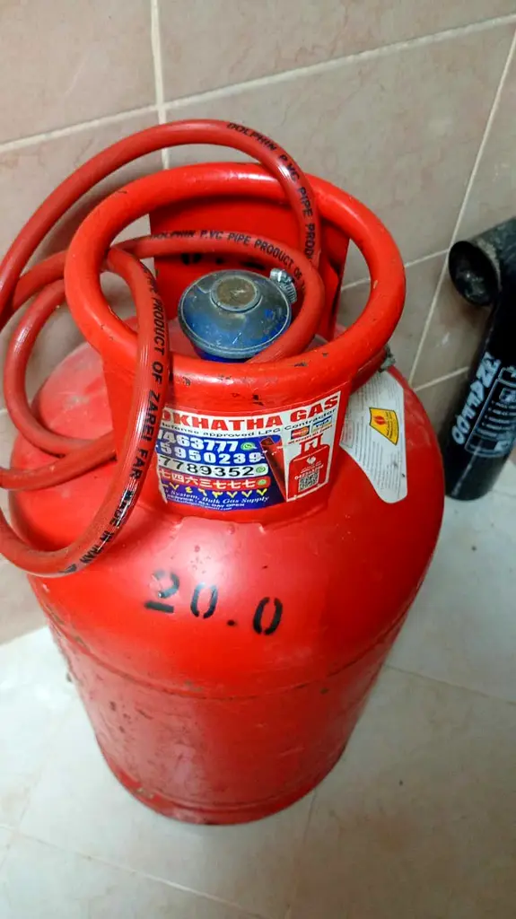 Gas cylinder ( almost filled ) with regulator