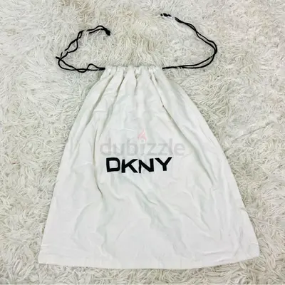 DKNY white dust bag for sale