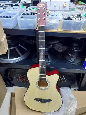 Strum Your Heart Out with this Silton Acoustic Guitar!