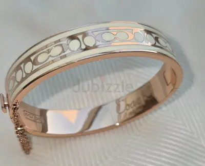 Elegant rose gold plated coach Bracelet with Inlay Design