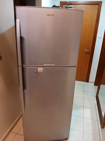 Hitachi two door fridge freezer 65cm width 170cm height 440 litter