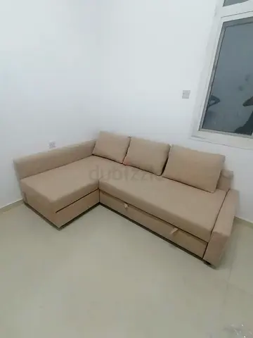 IKEA L Shape Sofa cum bed with big storage and you can fix the storage left or right any side