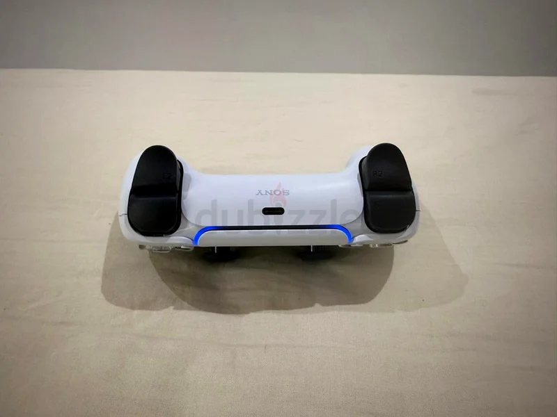 وحدة تحكم PlayStation 5 DualSense - حالة رائعة!63228831399298111