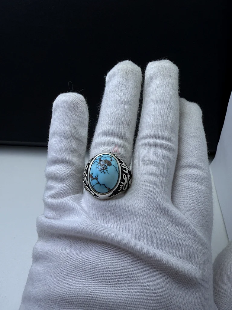 خاتم بحجر فيروز نيشابوري عنكبوتي فخم - A luxurious ring with a spiderweb-patterned Nishapuri turquoi63230183383169113