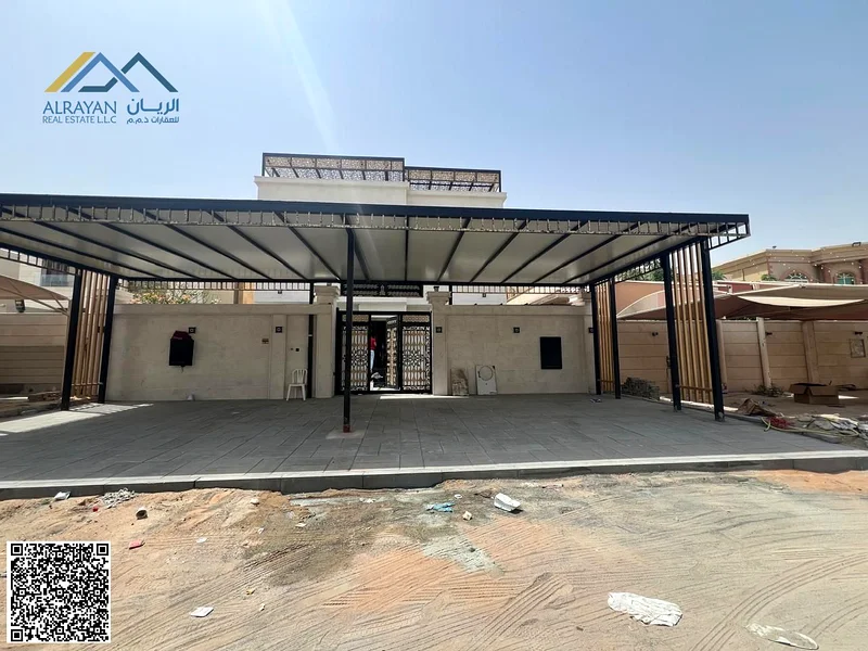Villa for sale in Al Muwaihat 1, Al Tallah Street, 5,000 square feet, consisting of 6 master bedrooms, a suite, a living room, and a swimming pool.63869813942273112