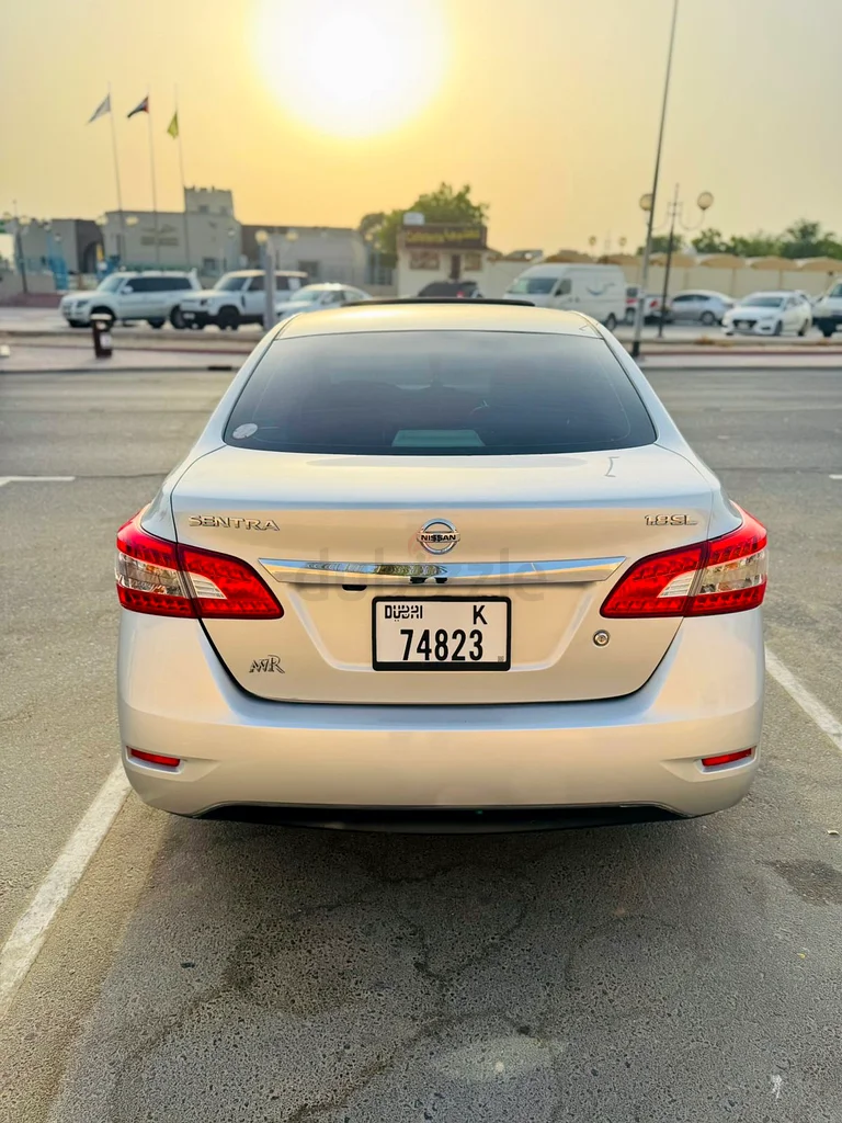 Nissan Sentra GCC spec 2 keys second owner full option with sunroof and leather seats63148165697666111