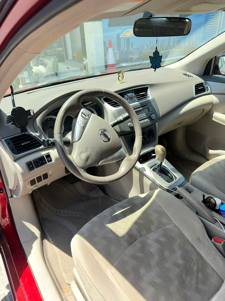 Nissan Sentra GCC specs lady driven 12.5 km/l mileage in city63137334782209113