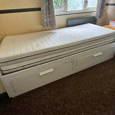IKEA brimness Day bed with 2 storage drawers underneath and with 2 IKEA mattresses