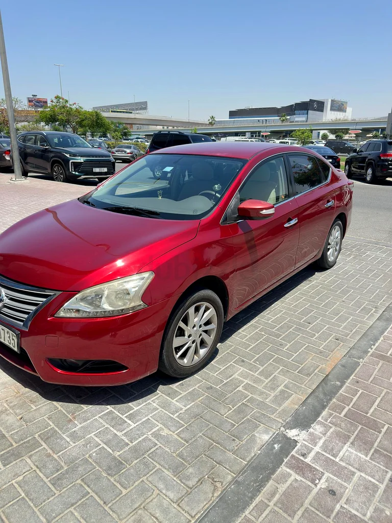 Nissan Sentra GCC specs lady driven 12.5 km/l mileage in city63137334782209111