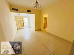2-bedroom apartment with a living room, balcony, two bathrooms, and built-in wardrobes for annual re
