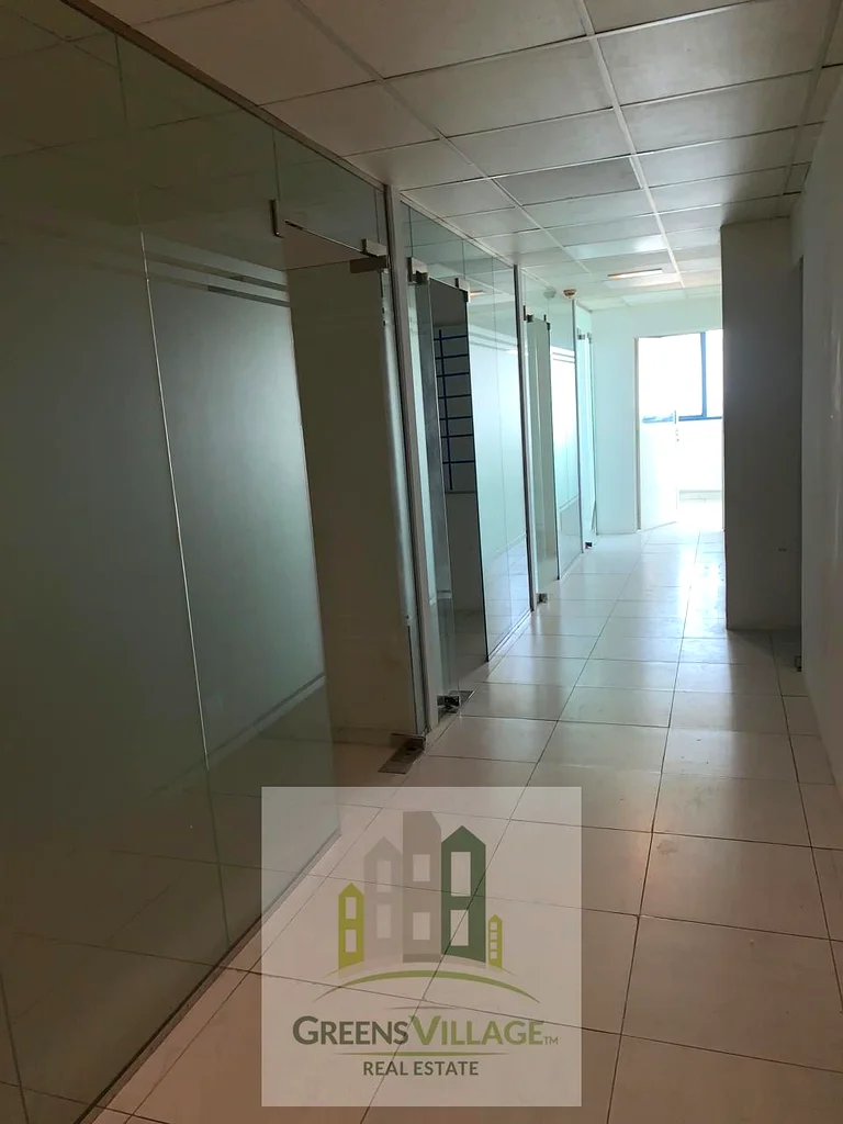 Spacious Office with partitions for Sale in Falcon Towers B1, Al Rashidiya, Ajman.63184692502529112