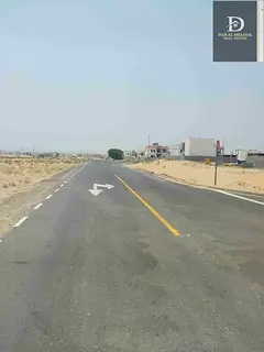 For sale in Sharjah, Al Hoshi area Residential land area 9100 feet Corner on three streets 24 meters