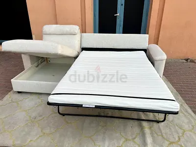 Selling Almost brand new IKEA Lidhult LShape Sofa bed with storage