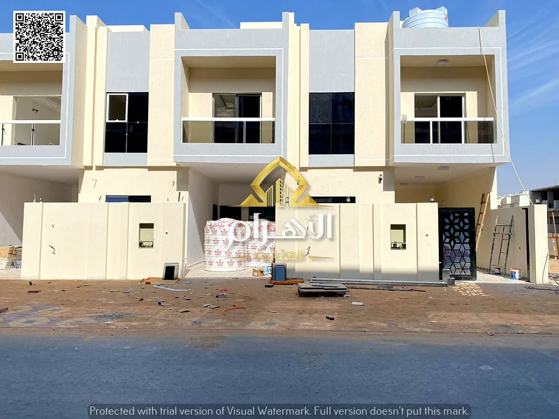 Townhouse at a competitive price, two floors and a roof, directly on the Emirates Road, without a down payment, freehold for all, close to all service63903397212289110