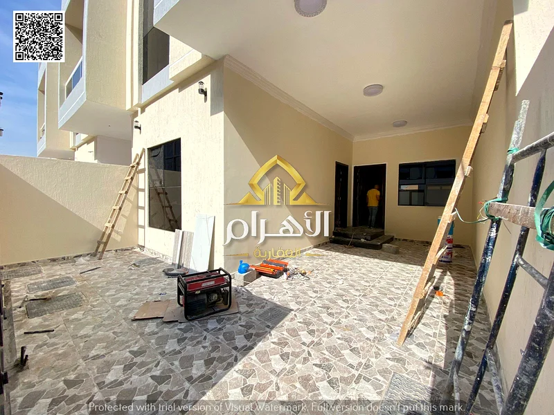 Townhouse at a competitive price, two floors and a roof, directly on the Emirates Road, without a down payment, freehold for all, close to all service63903397212289111