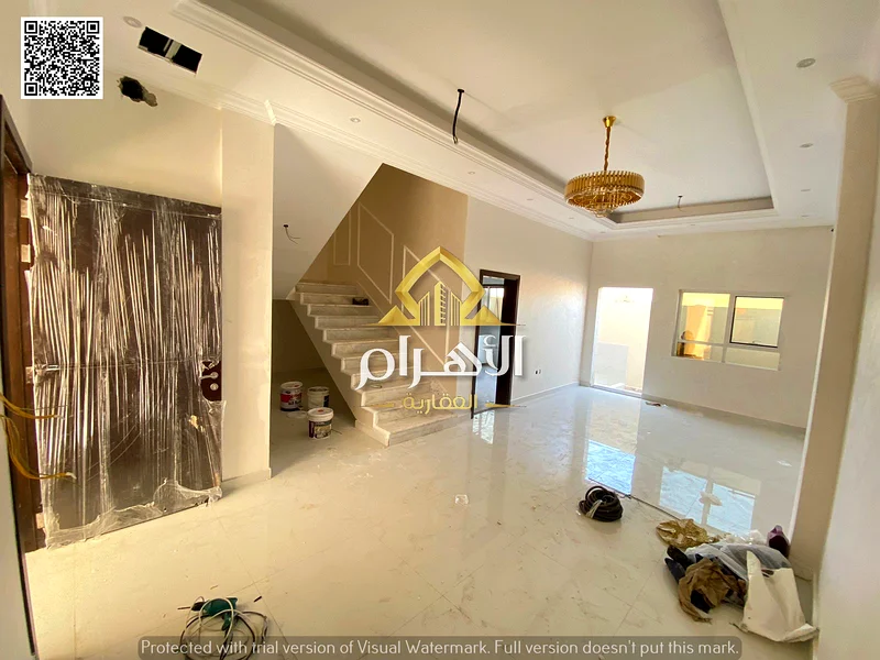 Townhouse at a competitive price, two floors and a roof, directly on the Emirates Road, without a down payment, freehold for all, close to all service63903397212289112