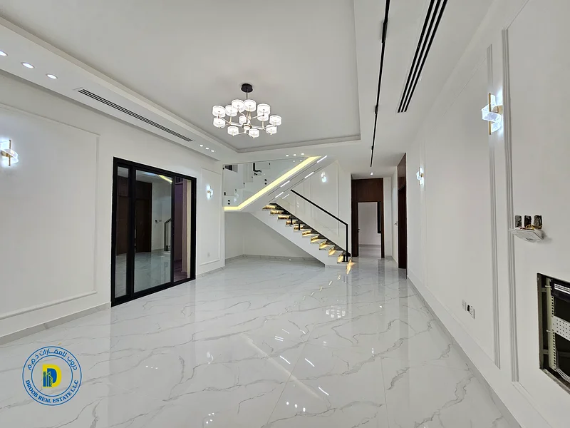 Hurry up and book your villa, ready to move in, including registration fees, freehold, in the most prestigious location in Al Helio, Ajman63899656655490112