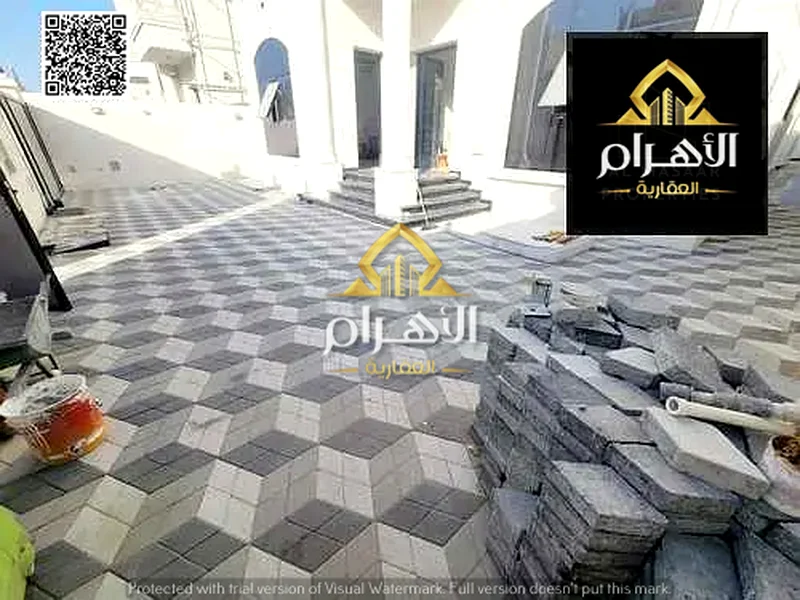 Seize the opportunity of a lifetime with a villa in Al Alia, 6 master bedrooms, including registration fees, electricity, water, and central air condi63877280004739114