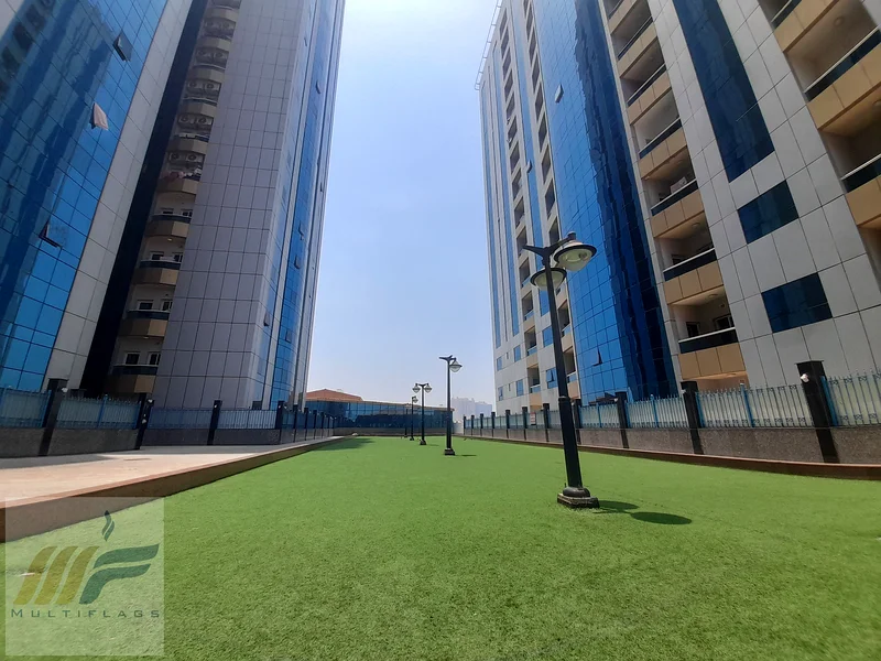 شقة مكونة من غرفتين نوم وصالة للبيع في برج أورينت مع خطة دفع63170398724867113