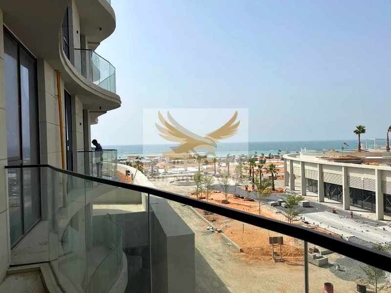 Stunning 1BR Apartment | Partial Sea View | Prime Location63858252473474111