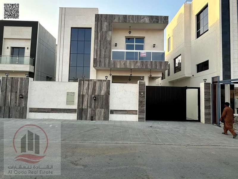 For sale, a villa in Ajman Al Yasmeen, 5 master rooms, a Majles room, a hall, and a maid’s room, freehold for all nationalities, Installment with out63252424445955113